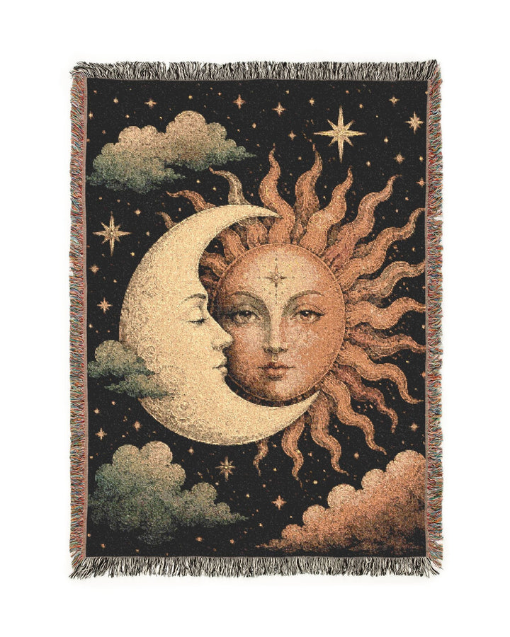 Woven tapestry with sun and moon design on a dark background