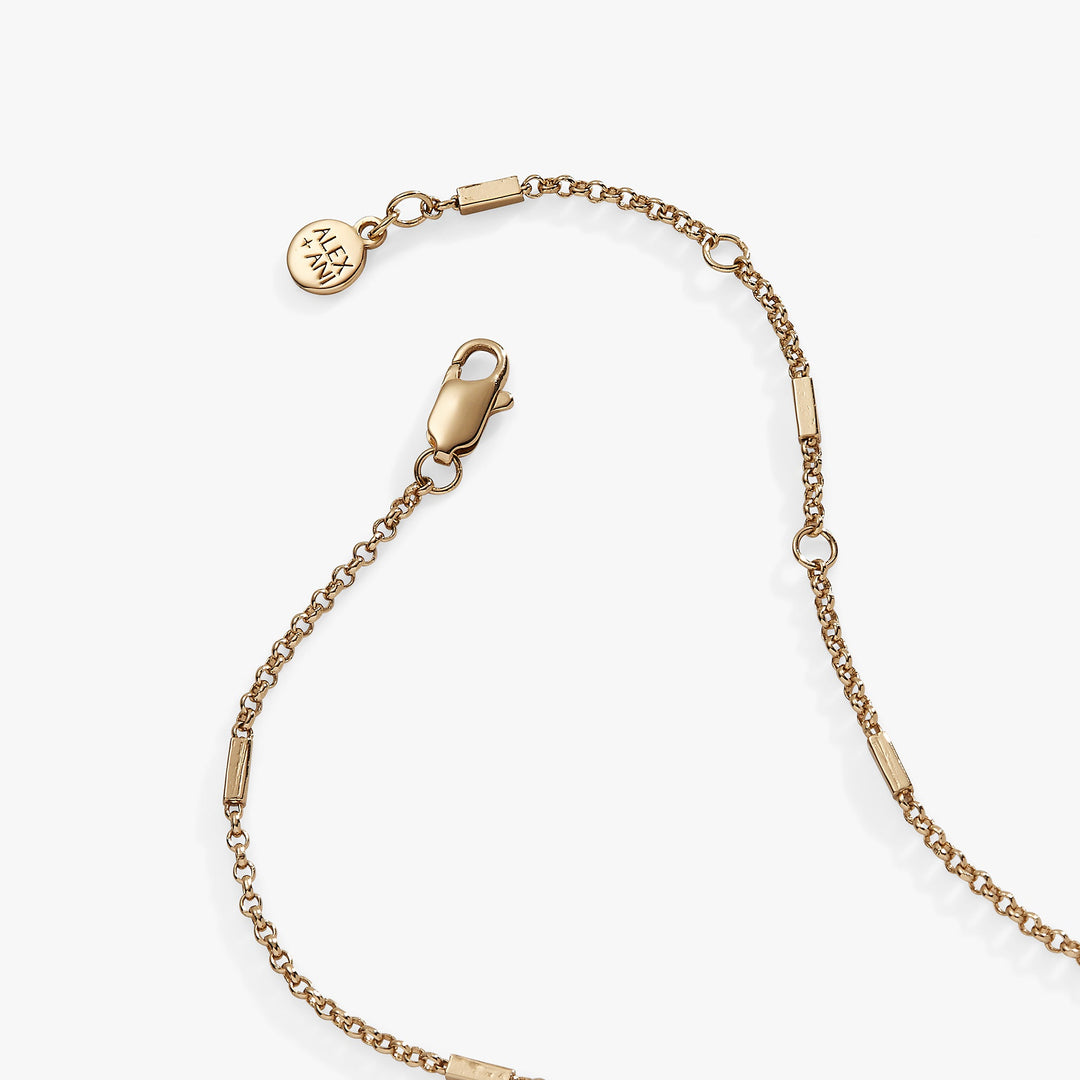 Gold bracelet with a clasp on a white background