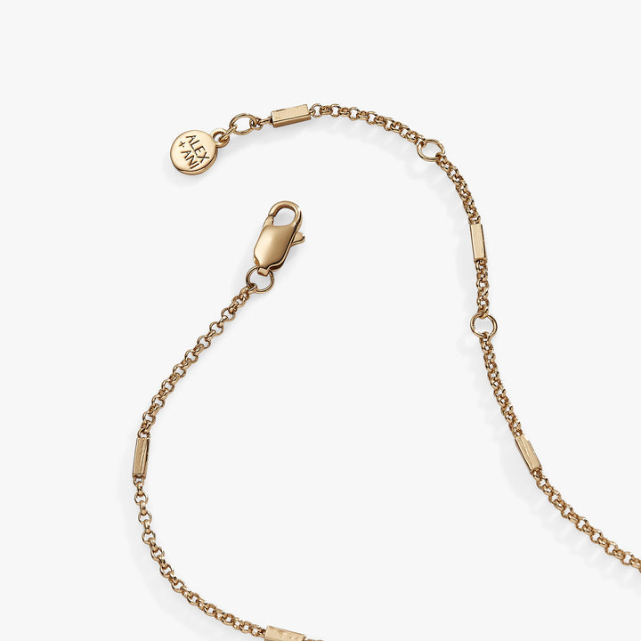 Gold bracelet with a clasp on a white background