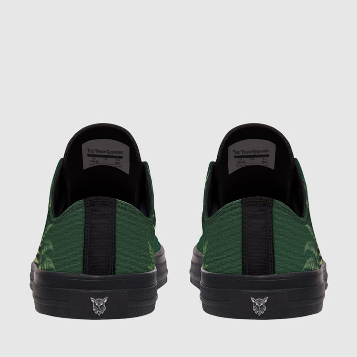Artemis Low Tops show green canvas backs with black rubber soles.