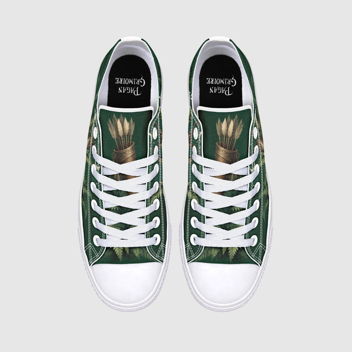 Artemis Low Tops show green canvas with wheat graphic and white laces.