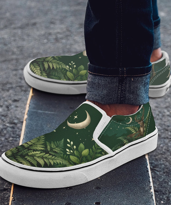 Artemis Slip On Shoes with green tropical print and white rubber sole, side view.