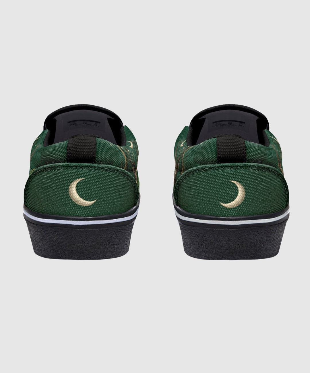 Artemis Slip On Shoes green canvas with black heel, white swoosh detail.