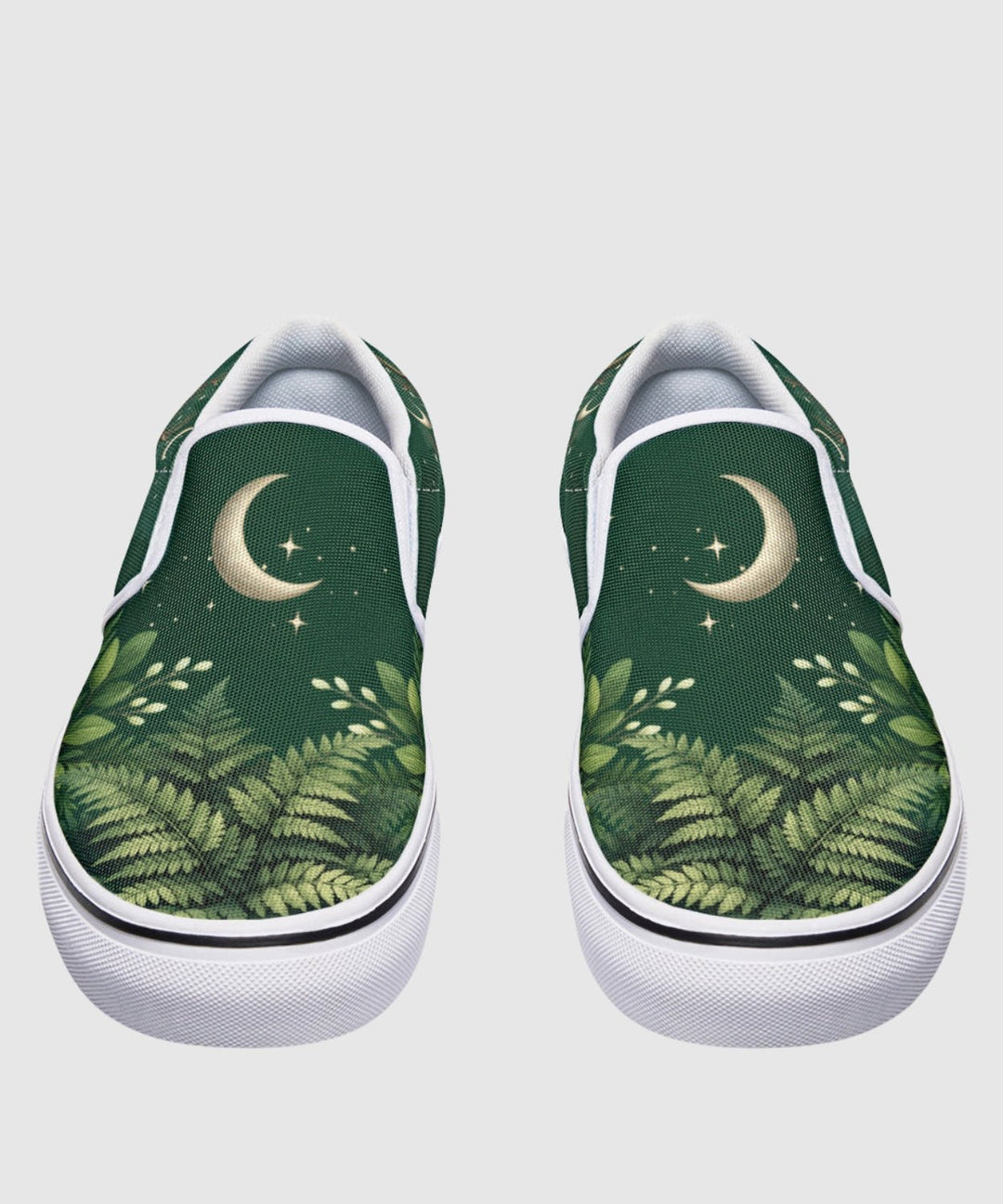 Artemis Slip On Shoes show green forest print with moon and stars.