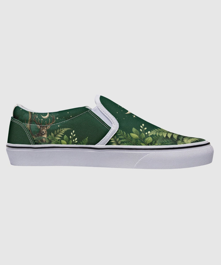 Artemis Slip On Shoes in green deer and star print, white trim.