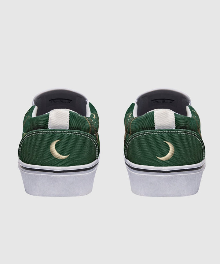 Artemis Slip On Shoes green canvas with white heel panels, rear view.