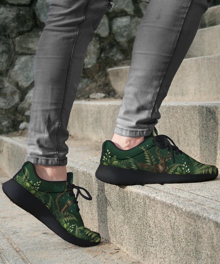 Artemis Sneakers in dark green with forest print, black sole, lace-up.