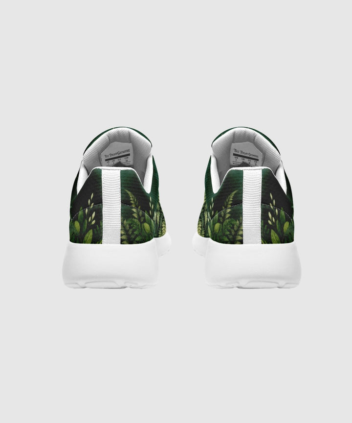 Artemis Sneakers rear view shows green leaf print panels, white sole, laces.