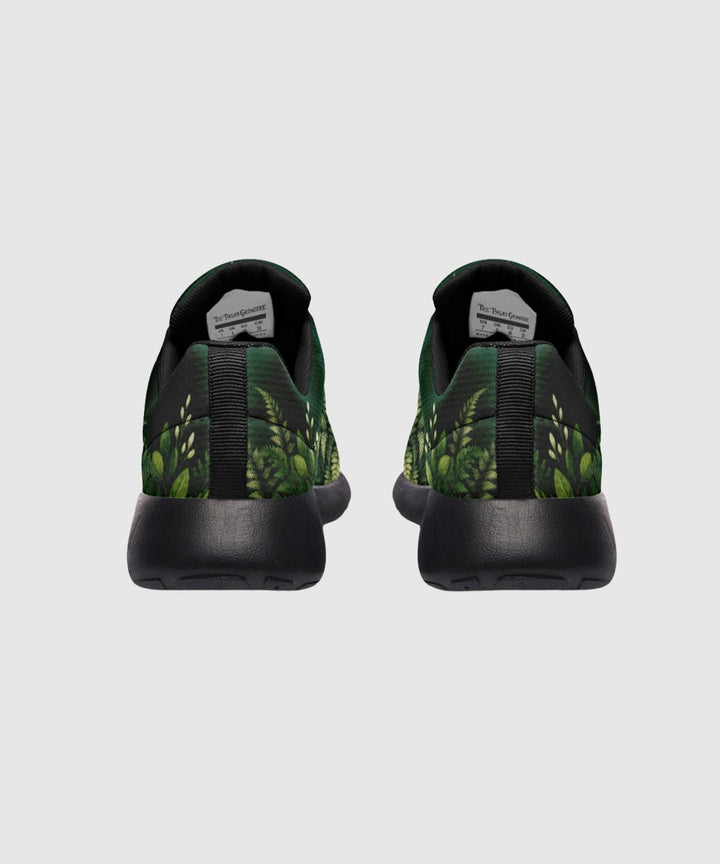 Artemis Sneakers rear view shows green leaf print with black heel panels.