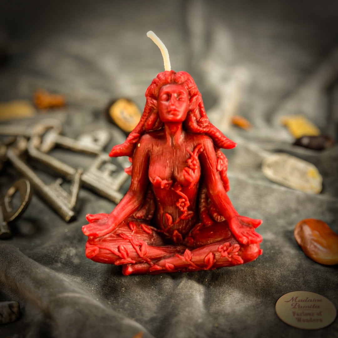 Beeswax Forest Fairy Spell Candle shaped figure with glowing flame, red wax.