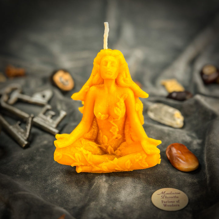 Beeswax Forest Fairy Spell Candle with glowing yellow flame, close-up detail.