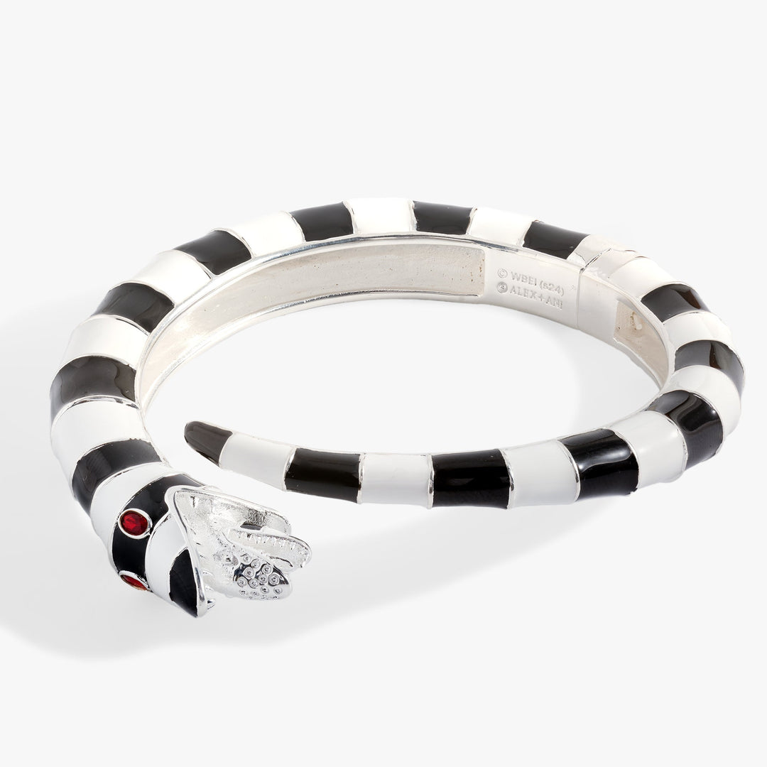 Black and white striped ring with a diamond on a white background