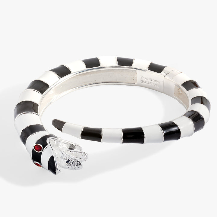 Black and white striped ring with a diamond on a white background