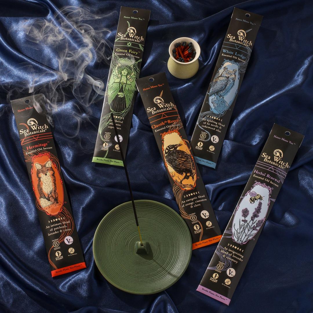 Incense gift set with five boxed sticks, green spiral holder, blue satin backdrop