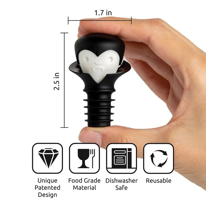 Hand holding a black wine bottle stopper with measurements and features displayed.