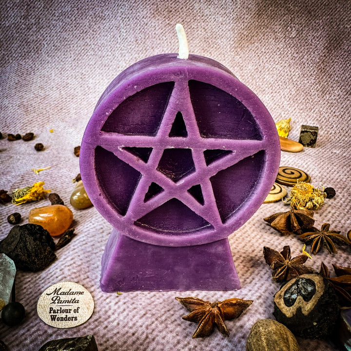 Beeswax Pentacle of Protection Spell Candle, purple pentagram cutout on round top.