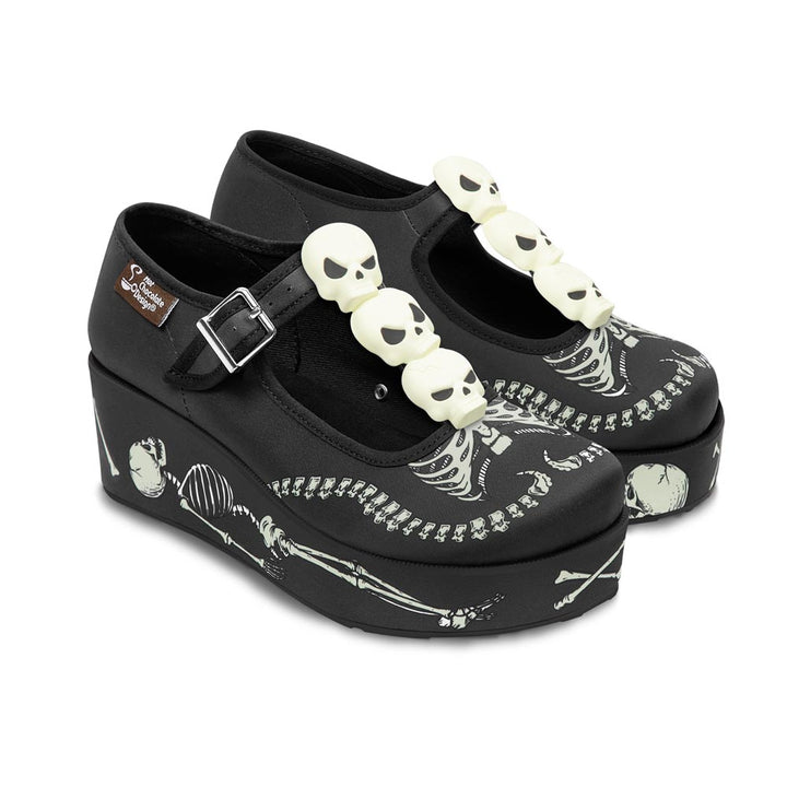 Chocolaticas Skeletons Under Your Bed Mary Jane platform shoes, black with skulls.