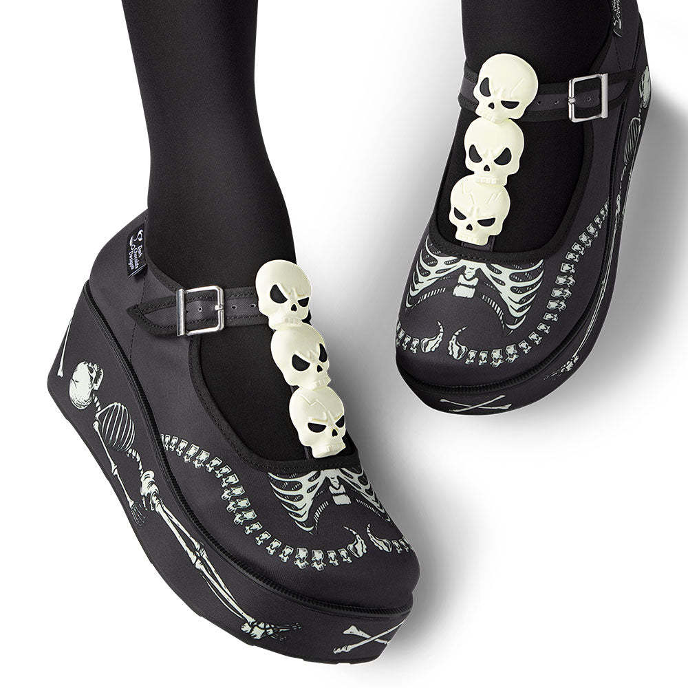 Chocolaticas Skeletons Under Your Bed Mary Jane platform shoes, black with white skulls.