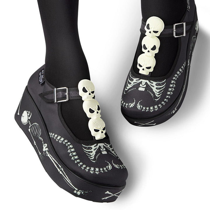 Chocolaticas Skeletons Under Your Bed Mary Jane platform shoes, black with white skulls.