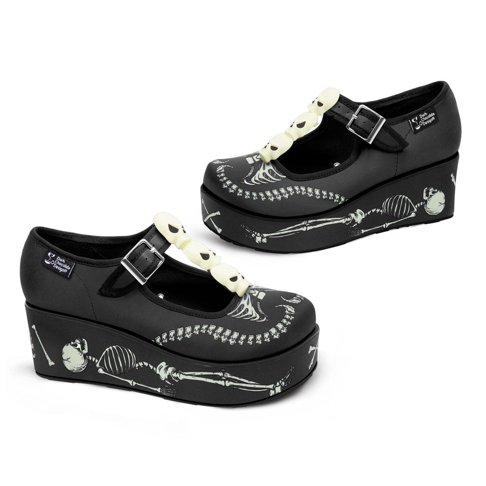 Black Mary Jane platform shoes with skeleton print and bone buckle straps