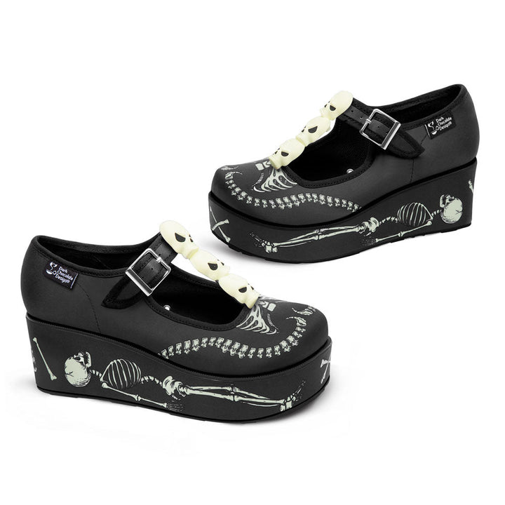 Black Mary Jane platform shoes with skeleton print and bone buckle straps