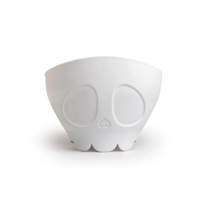 White ceramic bowl with skull design on a white background