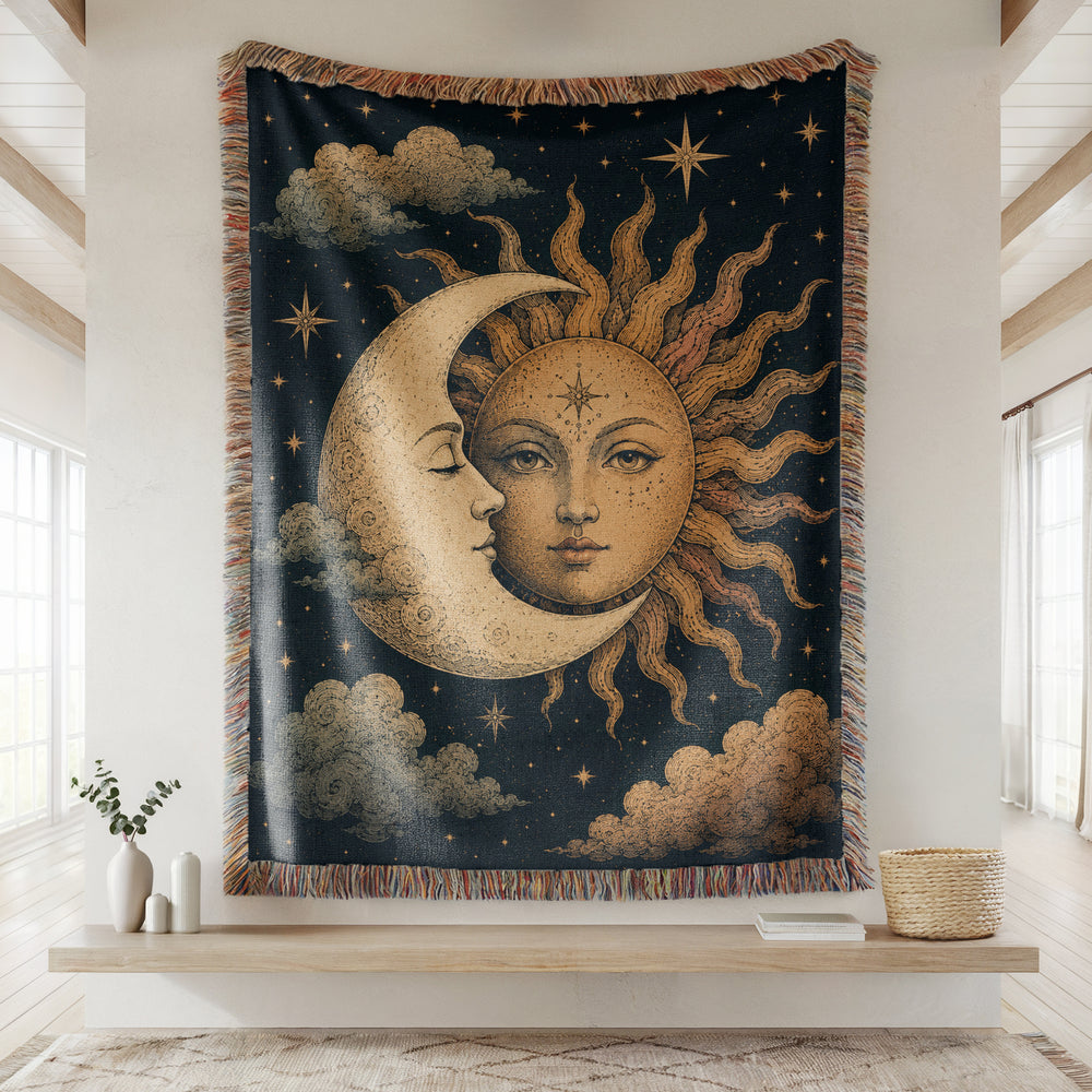 Decorative tapestry with sun and moon design hanging on a wall.