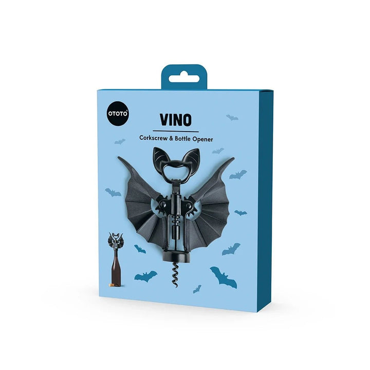 Bat-shaped corkscrew and bottle opener packaging on a light blue background
