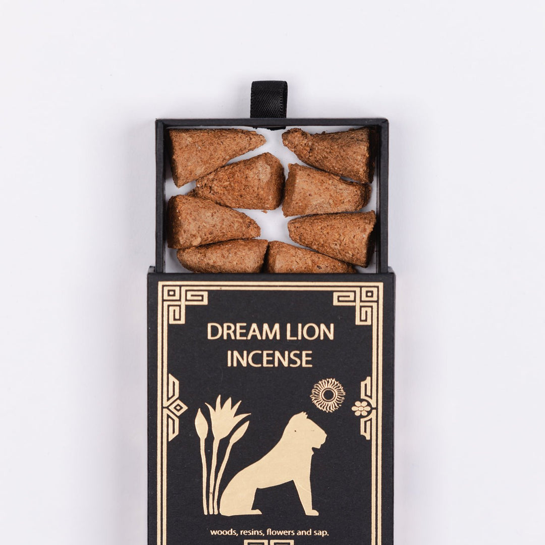 the wish granter incense box with gold text, open top, brown incense sticks