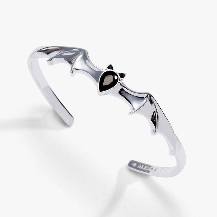 Silver ring with a black gemstone on a white background