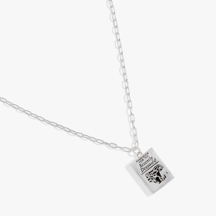 Silver Handbook for the Recently Deceased necklace with a square pendant on a white background