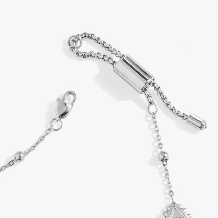 Silver bracelet with chain and clasp on a white background