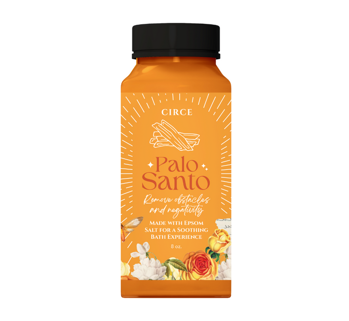 Orange bottle of Circe Palo Santo with black cap on a white background
