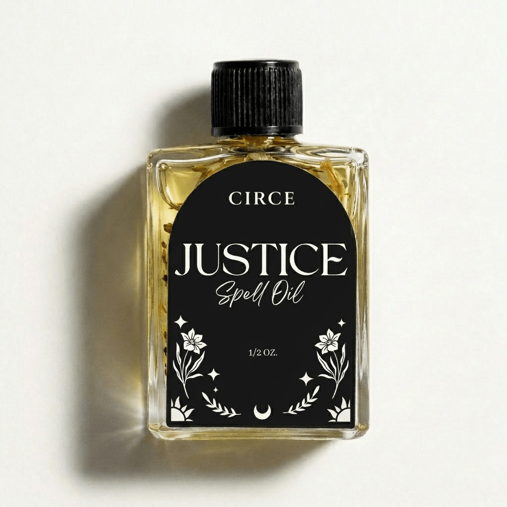 Bottle of Circe Justice Spell Oil with a black label on a light background