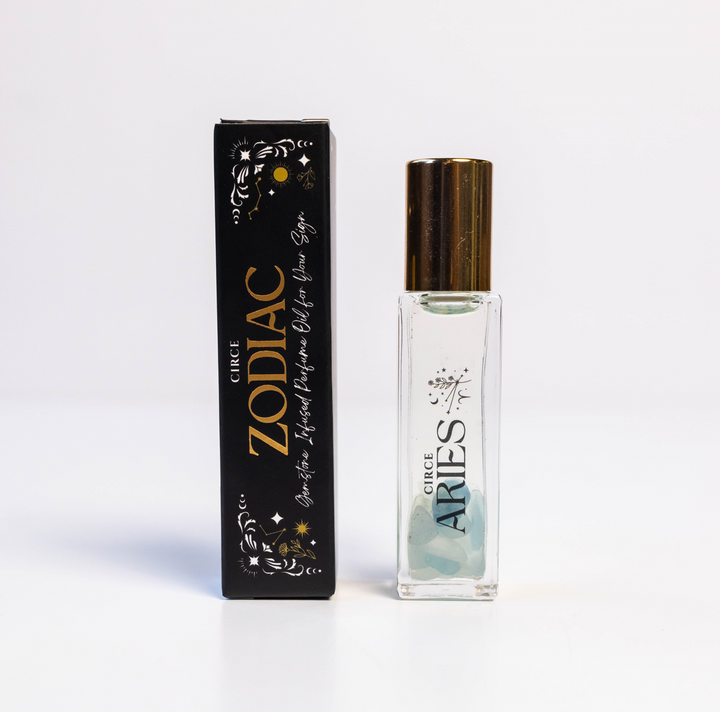 Perfume bottle labeled 'Aries' from the Zodiac series with packaging on a white background