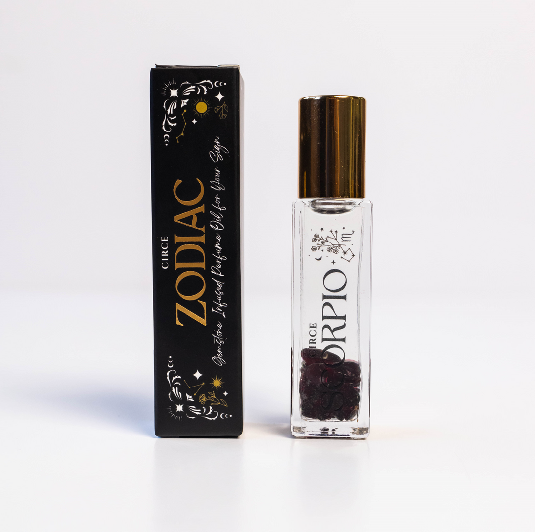Scorpio perfume bottle with zodiac sign label on a white background