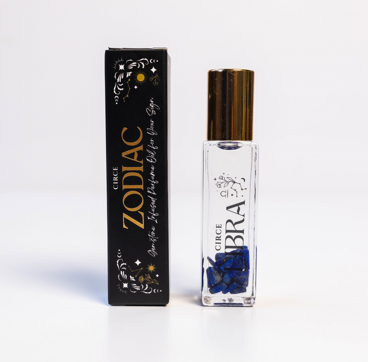Perfume bottle with gold cap and black box labeled 'Circe Zodiac' on a white background