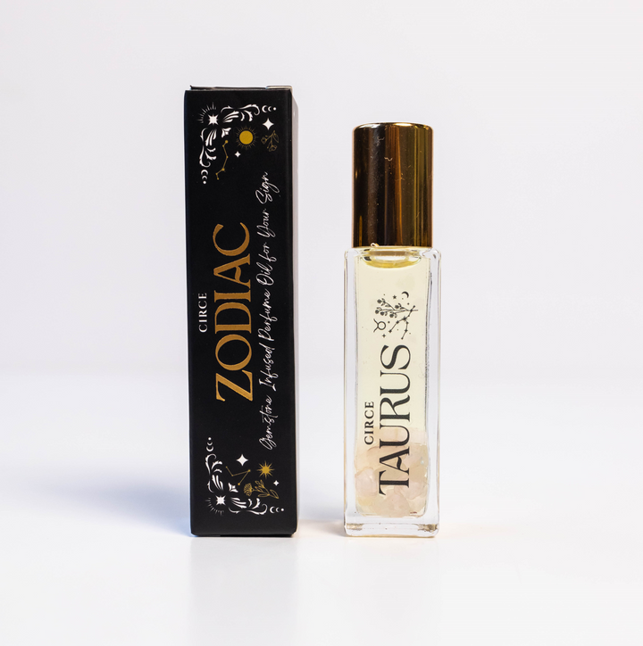 Perfume bottle labeled 'Taurus' with packaging on a white background